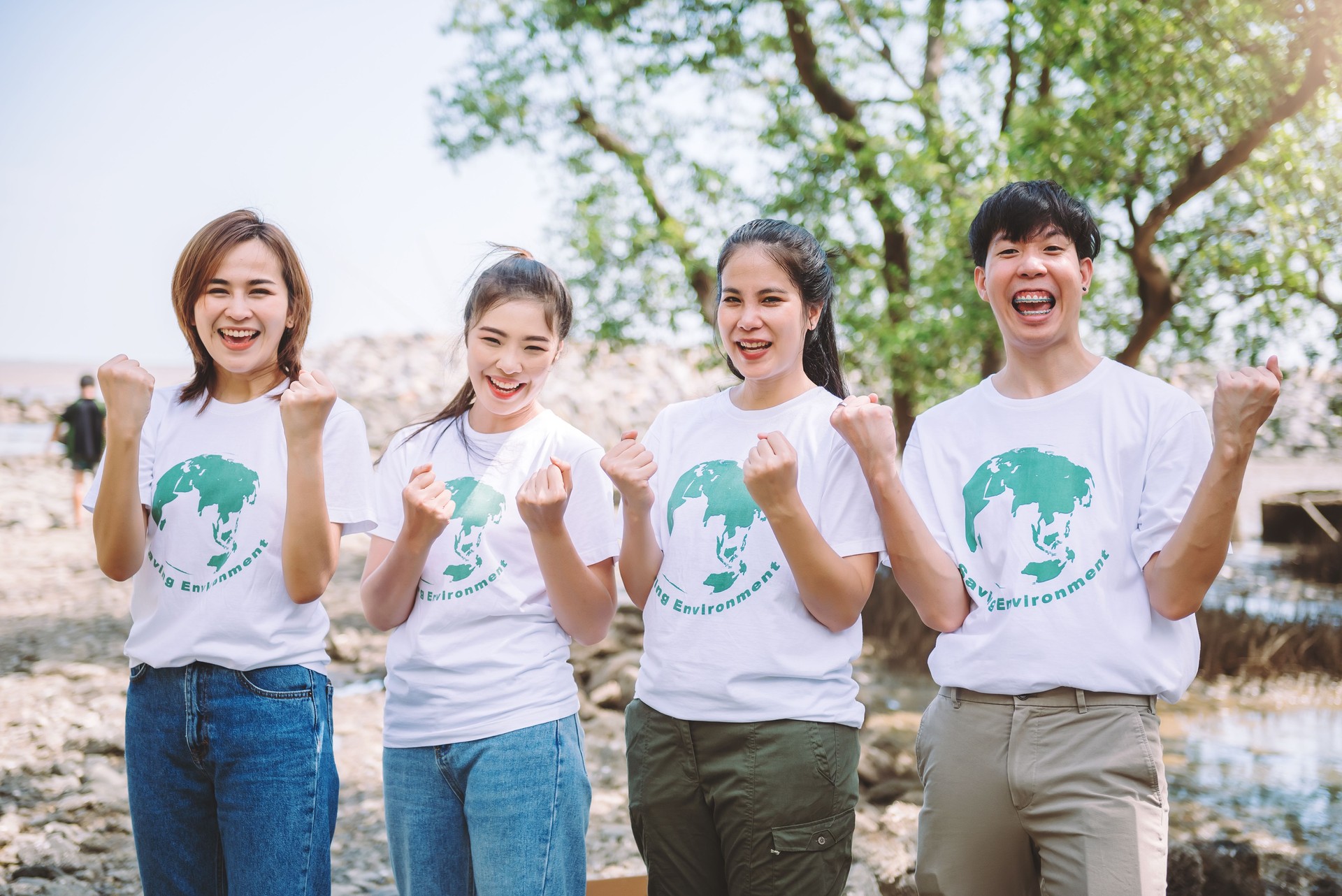 Group of Asian diverse people volunteer teamwork joining to success the goal on charity event ,Unity and teamwork on world environment day. Group of Asian diverse people volunteer teamwork joining to success the goal on charity event ,Unity and teamwork on world environment day.